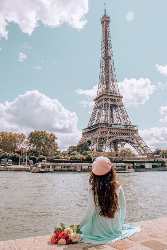 Garnish Takes France, woman in front of the Eiffel Tower in Paris France